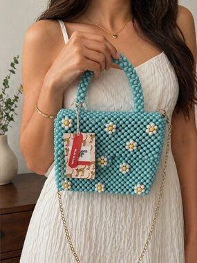 Bouffants and Broken Hearts by Kendra Dandy Blue & White Beaded Flower Handbag